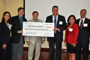 Jenna Ingraham, Director of Public Relations at Premier Beverage Company, joins Step Up For Students President Doug Tuthill, Premier CFO Eric Roth, Premier Managing Director of N. Florida Chris Nicolas, Carol Celis, a scholarship recipient’s parent, and Scott Ashley, President of Wine & Spirits Distributors of Florida.