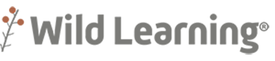 logo of Wild Learning. There is an image of a plant to the left of the letters.